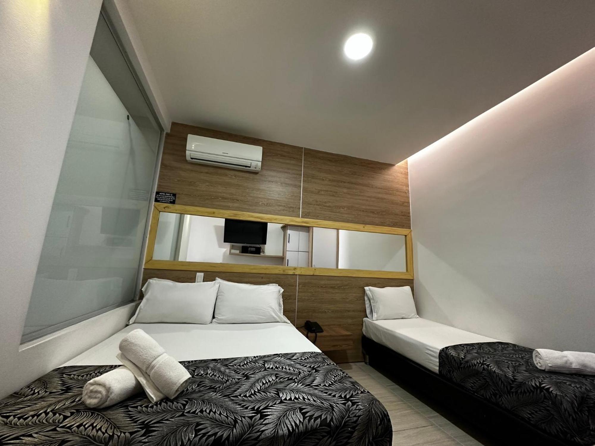 Hotel Piso 12 Bello Luaran gambar