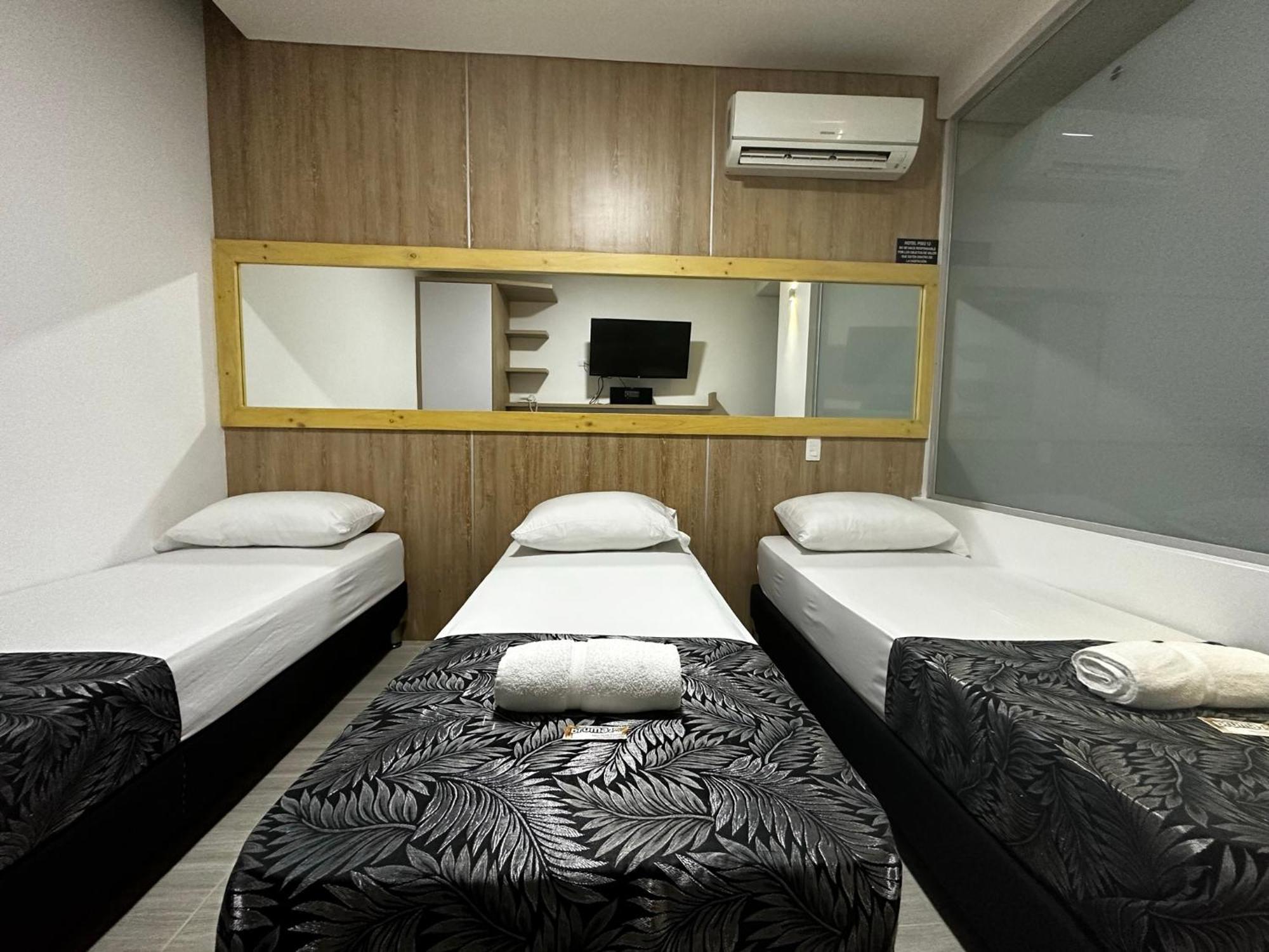 Hotel Piso 12 Bello Luaran gambar